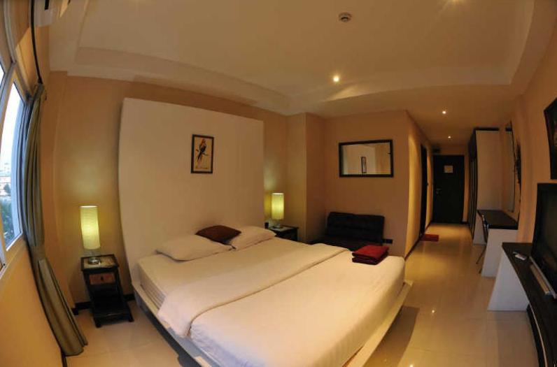 Le Parrots-Inn Pantai Jomtien Ruang foto